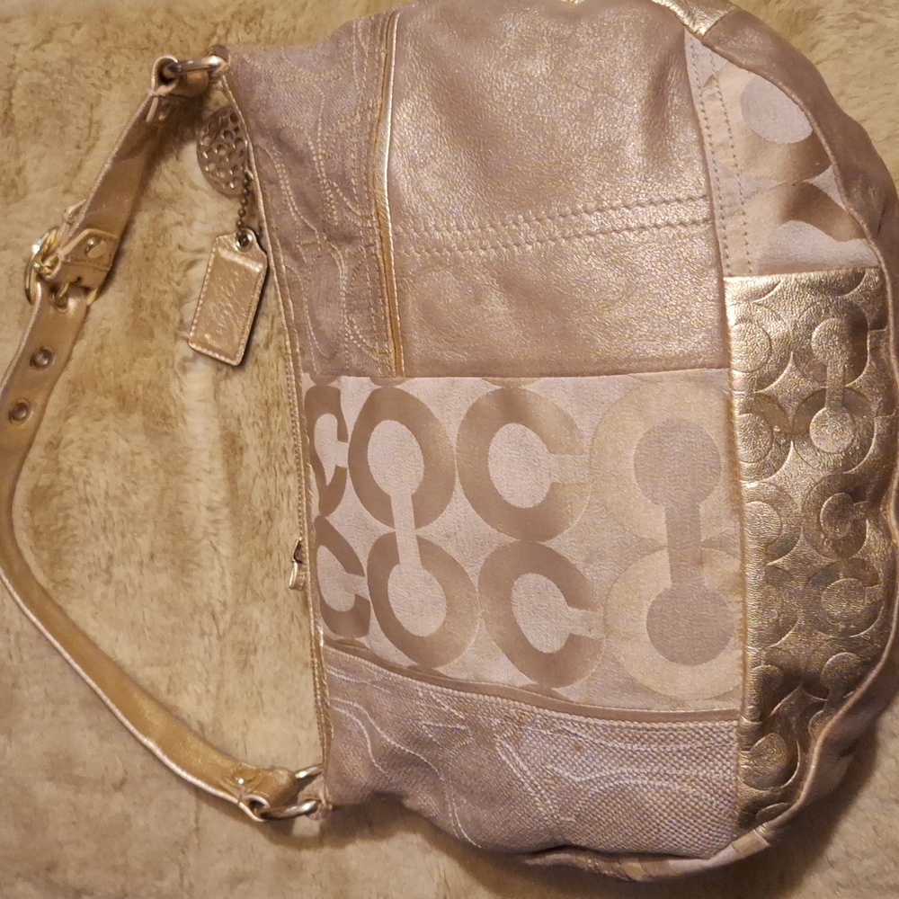 Gold coach hobo bag, great used condition. Please say pictures.